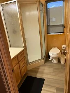 Slide: The Image of Cozy interior of 2005 Custom "The Entourage Share" with modern decor and large windows. - 8