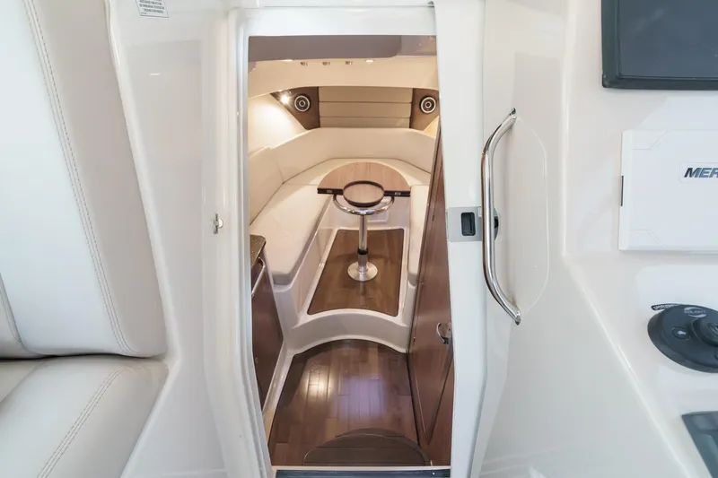 Slide: The Image of Interior cabin of 2019 Boston Whaler 315 Conquest with seating and table. - 104