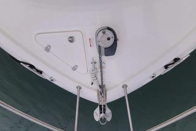 Slide: The Image of 2019 Boston Whaler 315 Conquest boat deck with anchor and winch system. - 16