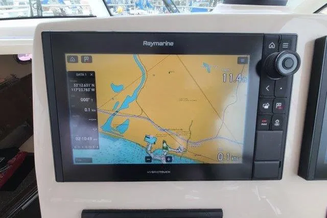 Slide: The Image of Raymarine navigation display on 2019 Boston Whaler 315 Conquest boat, showing nautical map. - 31