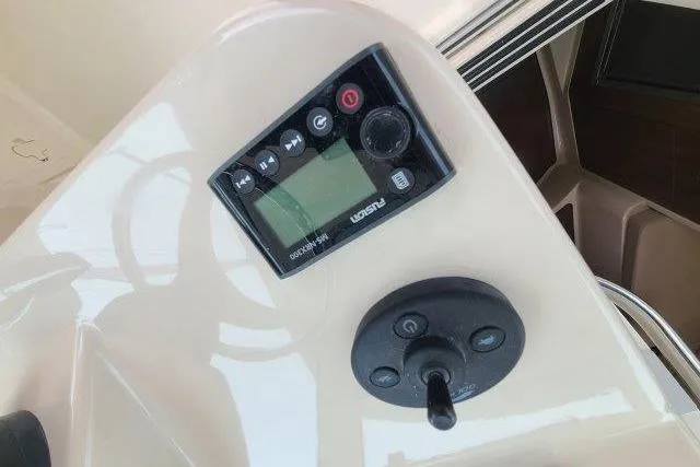 Slide: The Image of Control panel on 2019 Boston Whaler 315 Conquest boat dashboard. - 35