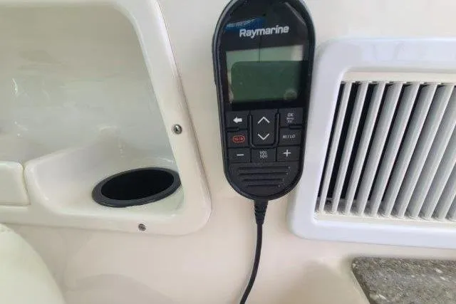 Slide: The Image of Raymarine control panel on 2019 Boston Whaler 315 Conquest boat interior. - 37
