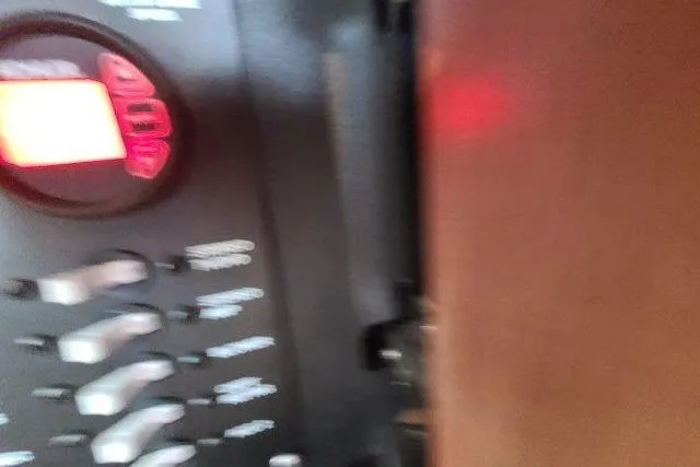 Slide: The Image of Control panel of a 2019 Boston Whaler 315 Conquest boat. - 71