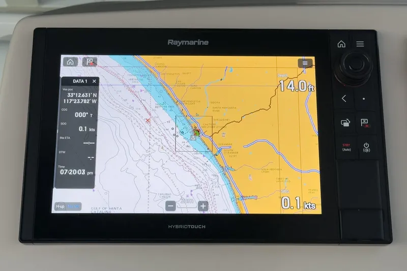 Slide: The Image of Raymarine navigation display on 2019 Boston Whaler 315 Conquest, showing map and coordinates. - 97