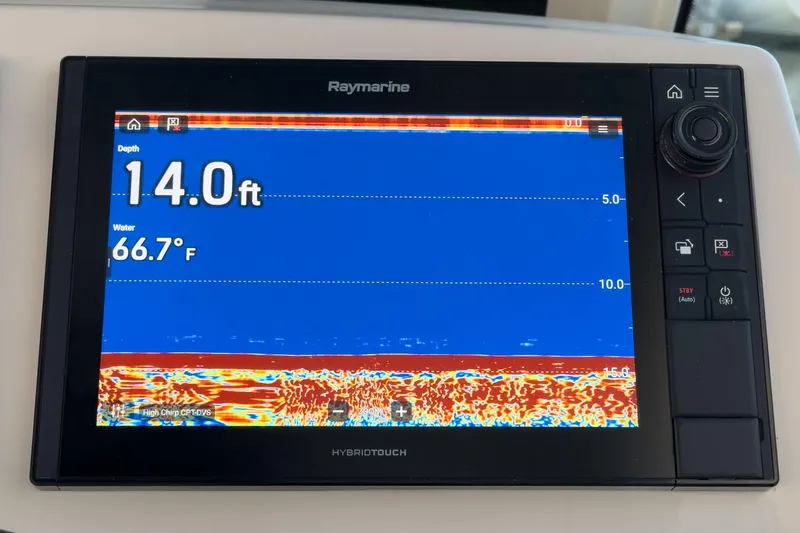 Slide: The Image of Raymarine display on 2019 Boston Whaler 315 Conquest showing depth and water temperature. - 98