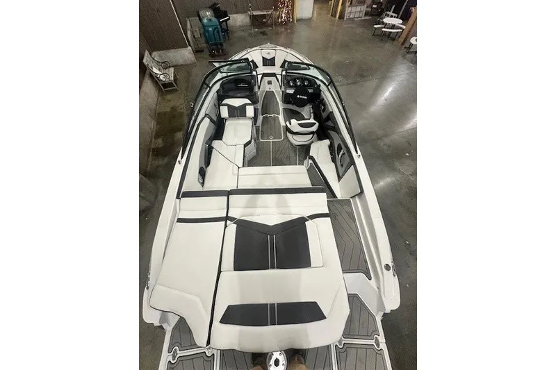 Slide: The Image of 2022 Monterey 238SS Super Sport boat interior with sleek seating and modern design. - 16