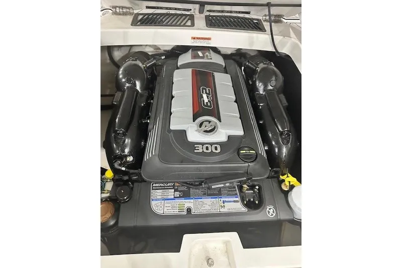 Slide: The Image of Engine of 2022 Monterey 238SS Super Sport boat, featuring a 6.2L Mercury 300 horsepower motor. - 18
