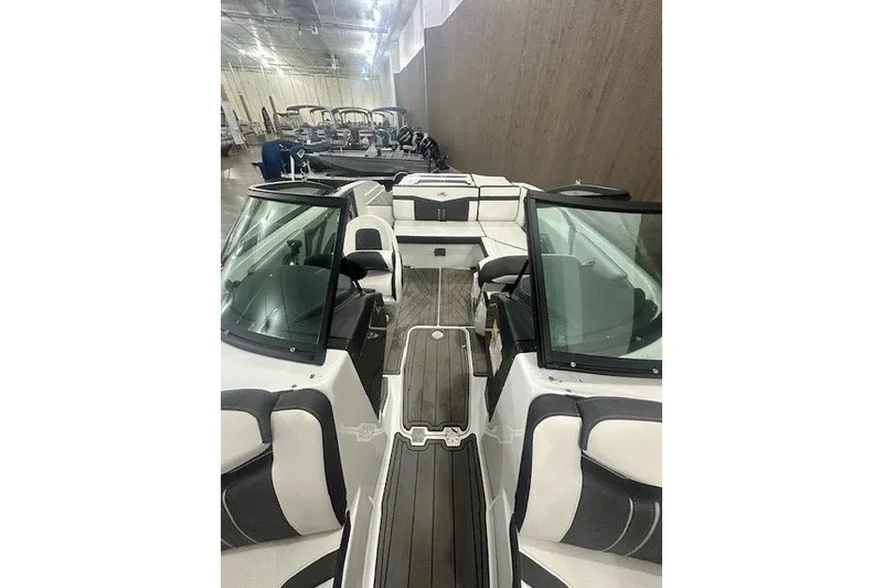 Slide: The Image of 2022 Monterey 238SS Super Sport boat interior with sleek seating and modern design. - 9