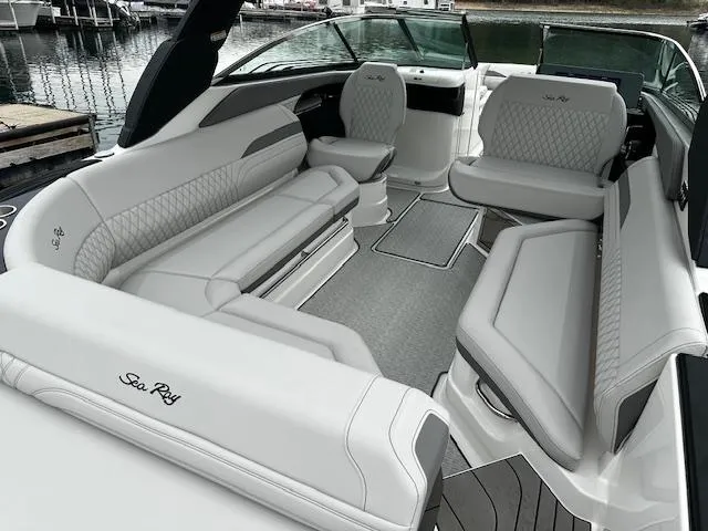 Slide: The Image of 2024 Sea Ray SLX 280 boat interior with luxurious seating and modern design. - 16
