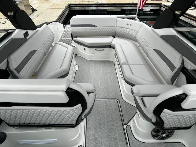 Slide: The Image of 2024 Sea Ray SLX 280 boat interior with luxurious seating and modern design. - 17