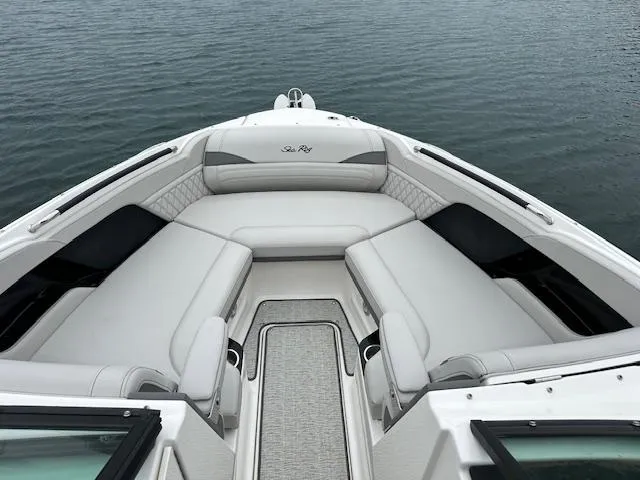 Slide: The Image of 2024 Sea Ray SLX 280 boat interior with luxurious seating. - 19