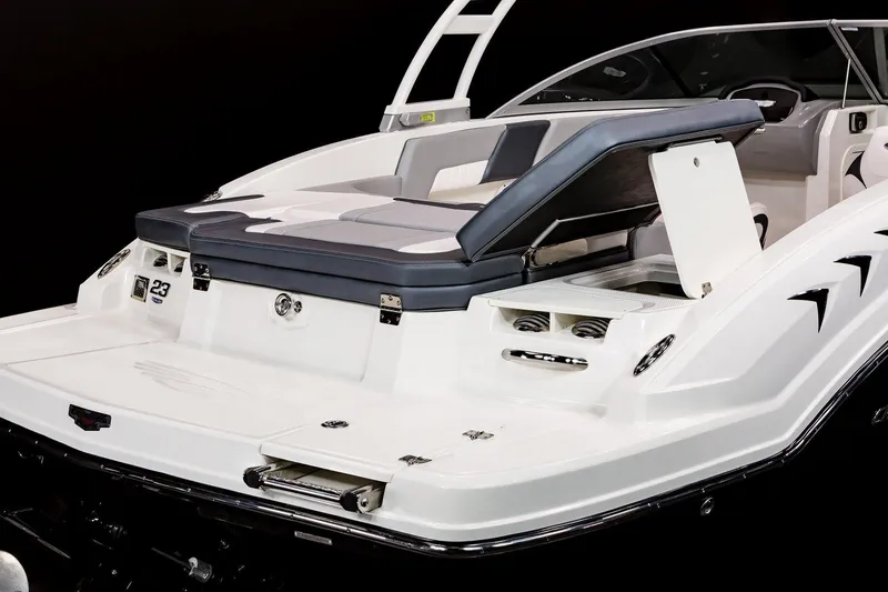 Slide: The Image of 2025 Chaparral 23 SSi boat with sleek white and gray seating. - 29