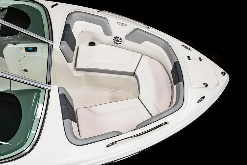 Slide: The Image of 2025 Chaparral 23 SSi boat interior, spacious bow seating area with cushioned seats. - 30