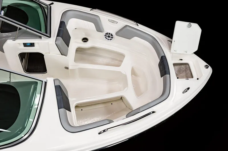 Slide: The Image of 2025 Chaparral 23 SSi boat interior, spacious seating and storage compartments. - 31