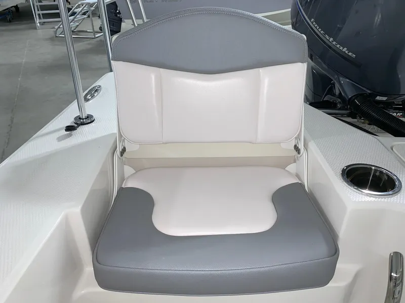 Slide: The Image of 2024 Robalo 206 Cayman boat seat with gray and white upholstery. - 10