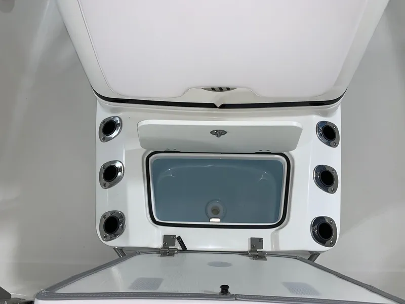 Slide: The Image of 2024 Robalo 206 Cayman boat livewell and rod holders. - 19