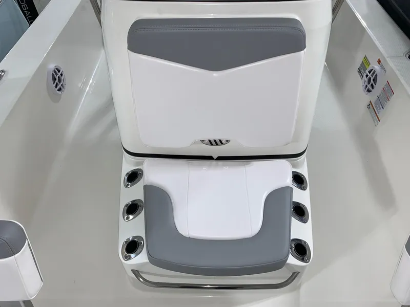 Slide: The Image of 2024 Robalo 206 Cayman boat seating with cup holders and storage. - 21