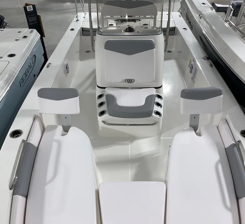 Slide: The Image of 2024 Robalo 206 Cayman boat interior with seating and console. - 5