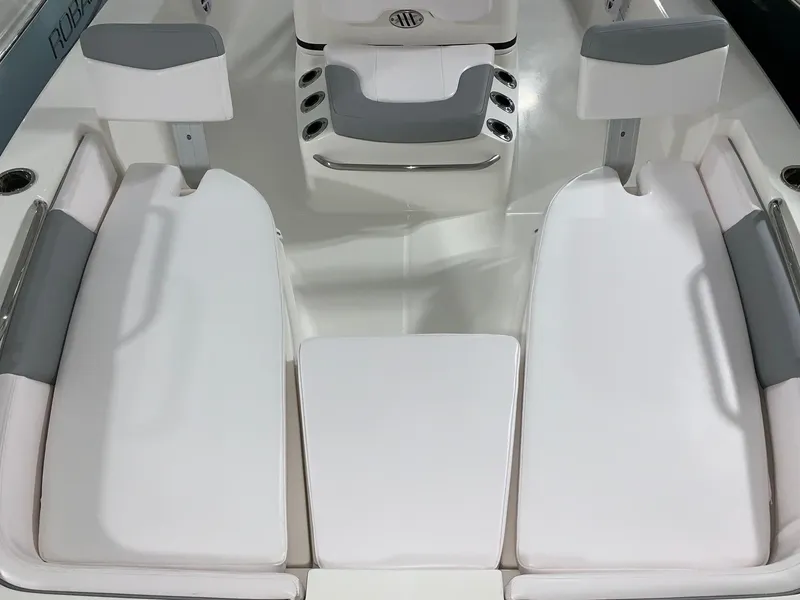 Slide: The Image of 2024 Robalo 206 Cayman boat interior seating and console. - 6