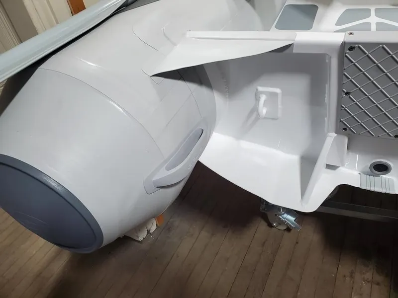 Slide: The Image of Close-up of a 2023 Gala A270D boat engine and hull detail. - 3