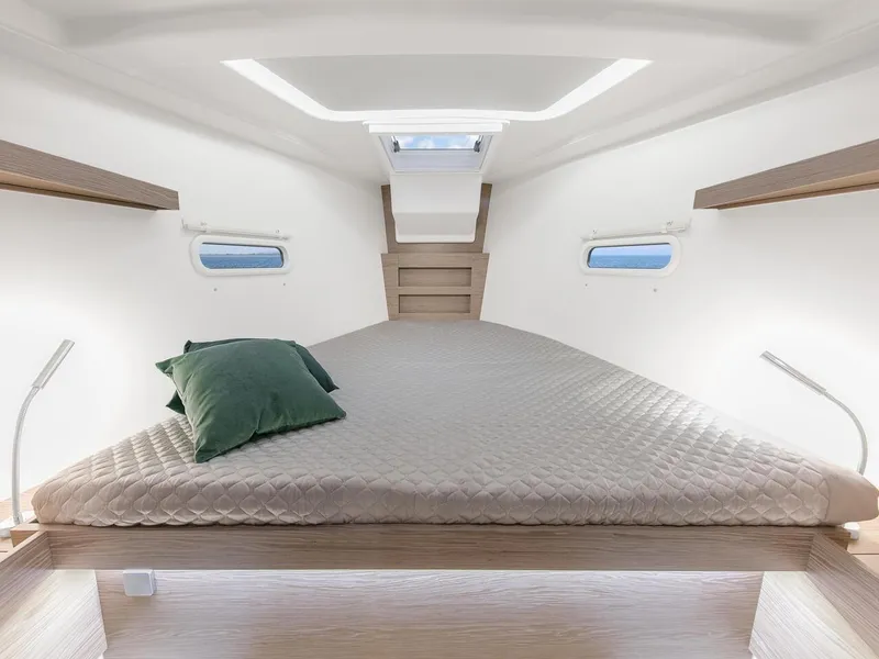 Slide: The Image of Luxurious interior of 2025 Hanse 388 yacht with cozy bed and modern design. - 12