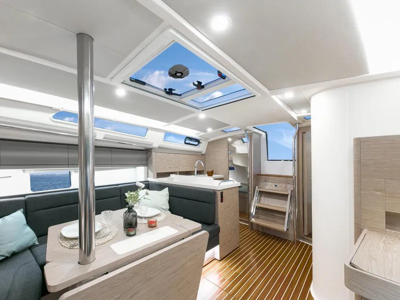 Slide: The Image of Modern interior of 2025 Hanse 388 yacht with sleek design and natural lighting. - 13