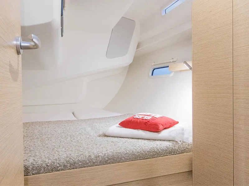 Slide: The Image of Cozy cabin interior of 2025 Hanse 388 yacht with modern design. - 21