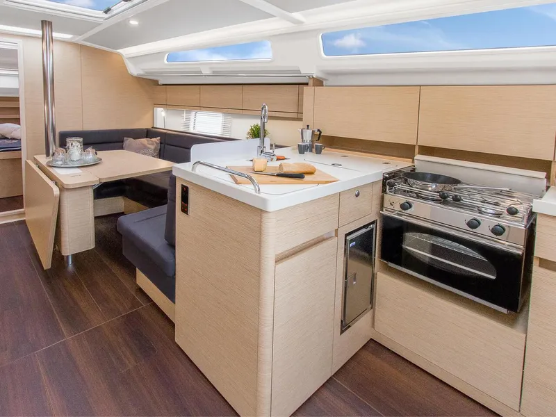 Slide: The Image of Modern interior of 2025 Hanse 388 yacht with kitchen and dining area. - 22