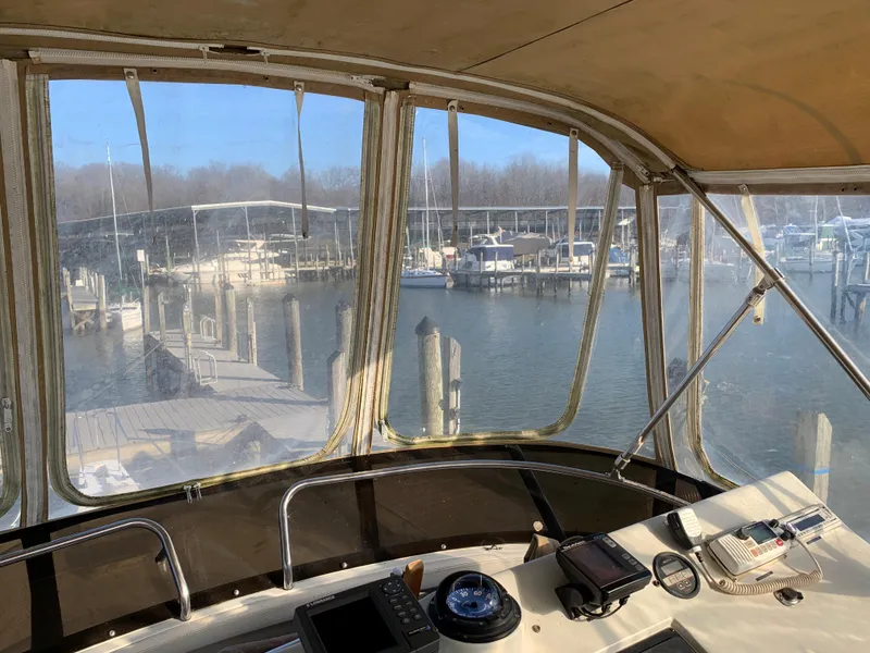 Slide: The Image of 1992 Silverton 34 Aft Cabin Motor Yacht interior view at marina dock. - 21
