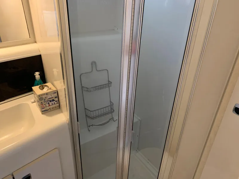 Slide: The Image of Shower area in 1992 Silverton 34 Aft Cabin Motor Yacht bathroom. - 31