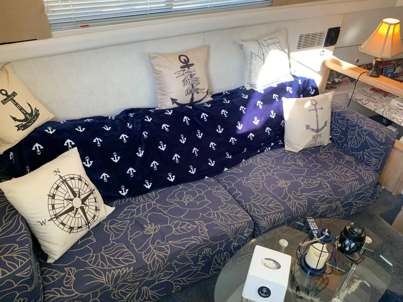 Slide: The Image of Interior of 1992 Silverton 34 Aft Cabin Motor Yacht with nautical-themed decor. - 39