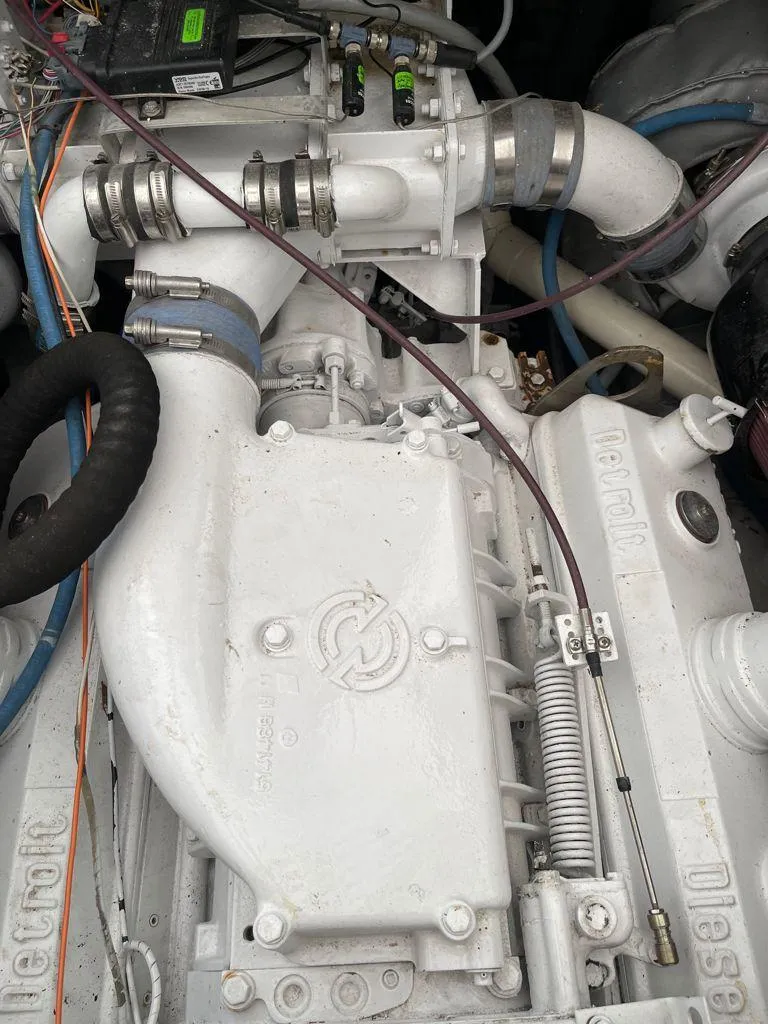 Slide: The Image of 1984 Magnum Marine engine with visible components and wiring. - 14