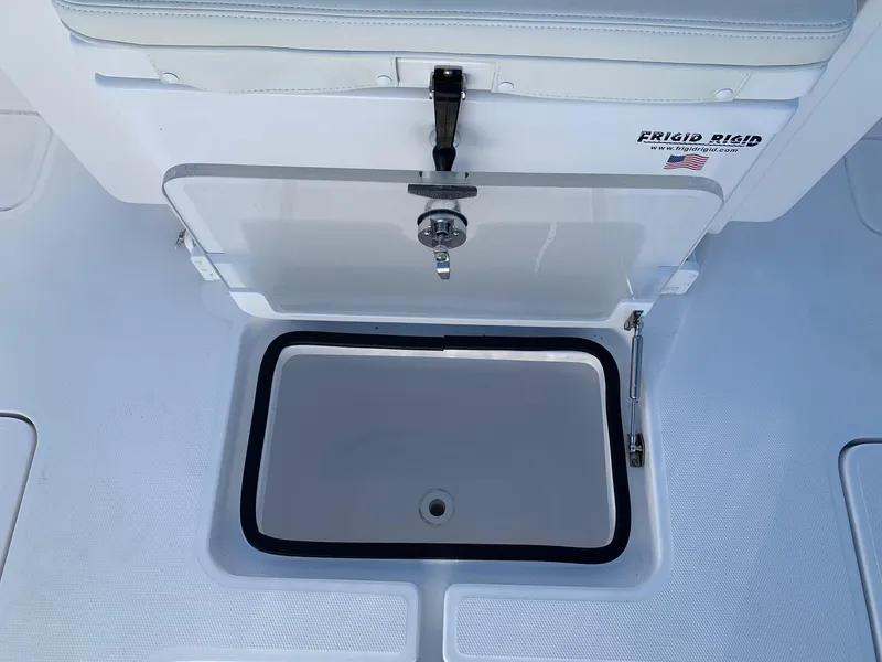 Slide: The Image of Open storage compartment on 2024 Invincible 33 Open Fisherman boat. - 11