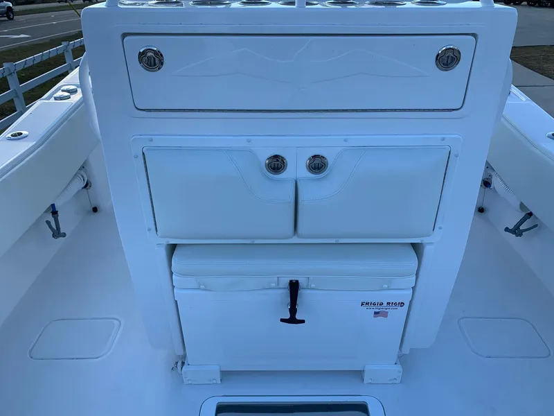 Slide: The Image of 2024 Invincible 33 Open Fisherman boat interior with storage compartments. - 16