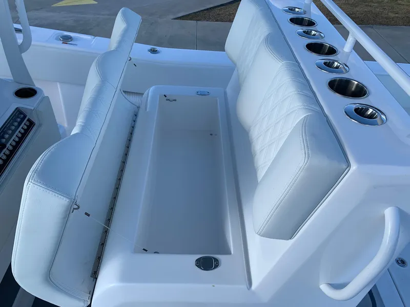 Slide: The Image of 2024 Invincible 33 Open Fisherman boat seating and storage compartment. - 21