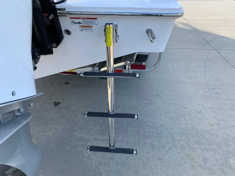 Slide: The Image of 2024 Invincible 33 Open Fisherman boat with a retractable boarding ladder. - 37