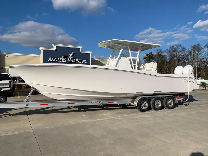 Slide: The Image of 2024 Invincible 33 Open Fisherman boat on trailer at Anglers Marine NC. - 0