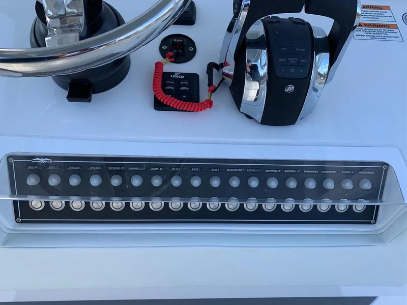 Slide: The Image of Control panel of the 2024 Invincible 33 Open Fisherman boat. - 20