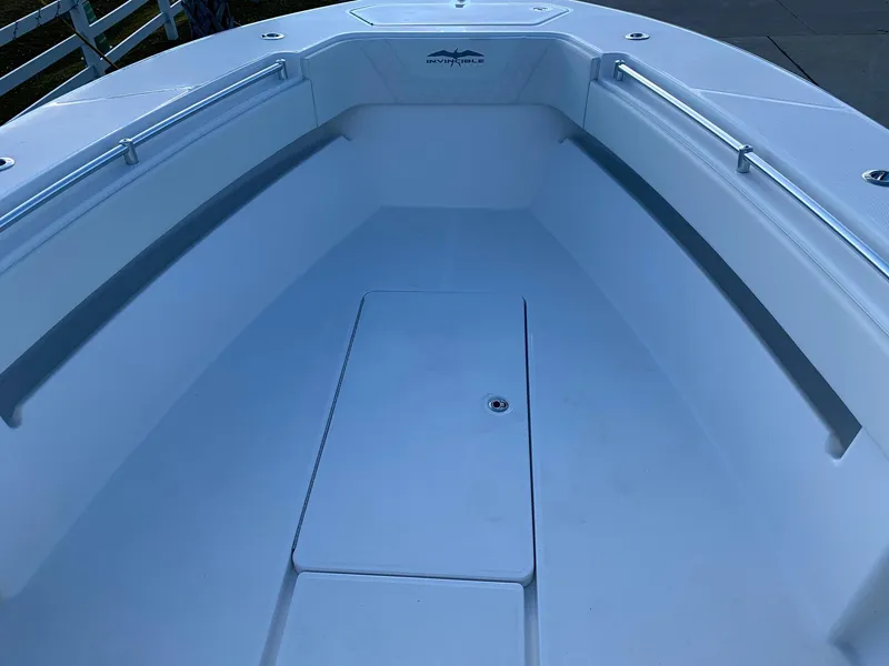 Slide: The Image of 2024 Invincible 33 Open Fisherman boat interior, spacious and clean deck. - 36