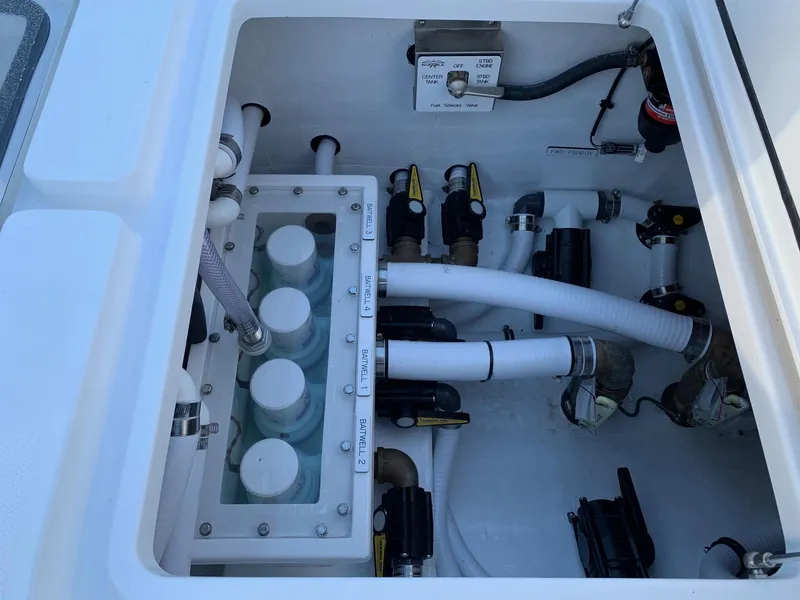 Slide: The Image of 2024 Invincible 33 Open Fisherman boat plumbing system and components. - 40