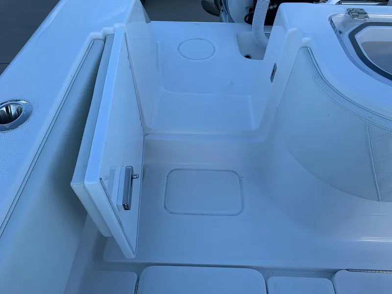 Slide: The Image of 2024 Invincible 33 Open Fisherman boat deck with storage compartment. - 7