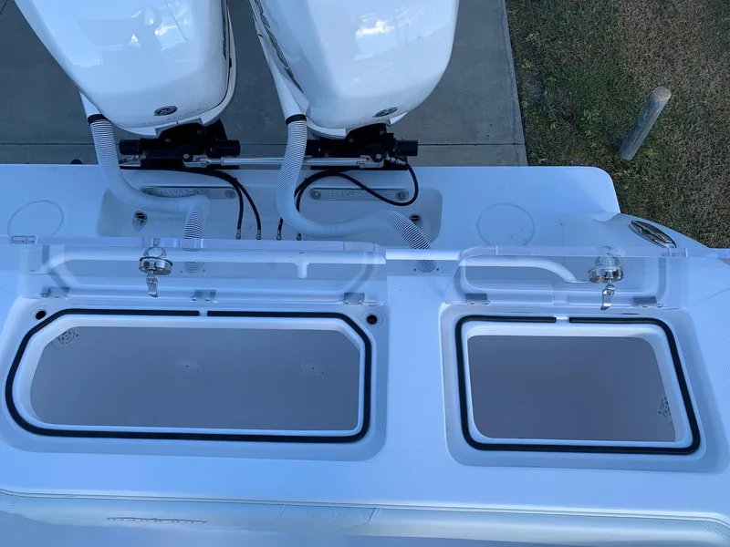 Slide: The Image of 2024 Invincible 33 Open Fisherman dual outboard engines and livewells. - 8