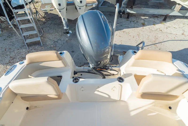 Slide: The Image of Rear view of a 2026 Scout 195 Sport Dorado boat with outboard motor. - 7