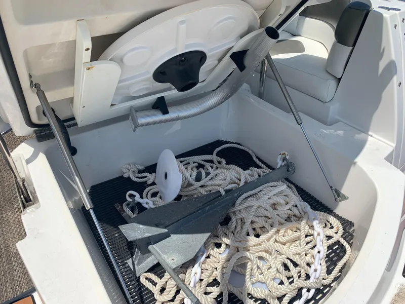 Slide: The Image of An anchor locker on a 2015 Monterey 275 Sport Yacht with anchor and ropes. - 25