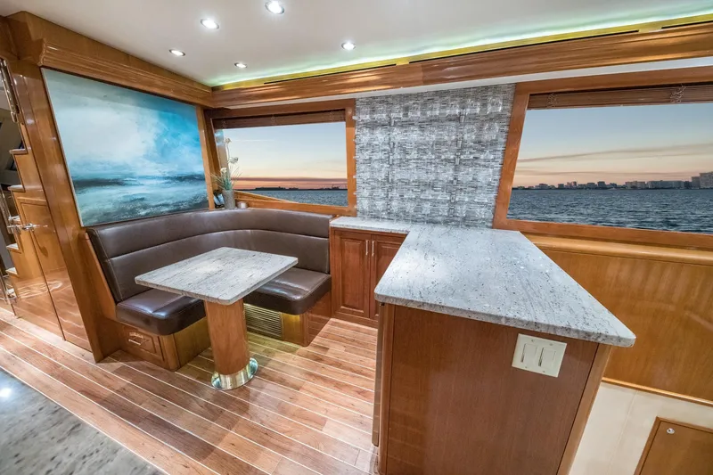 Slide: The Image of Luxurious 2002 Hatteras Motor Yacht interior with elegant wood and marble finishes. - 26