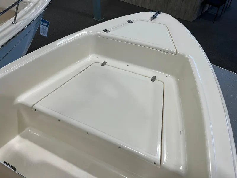Slide: The Image of 2024 Scout 175 Sportfish boat deck with storage compartments. - 9