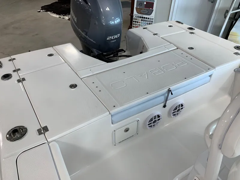 Slide: The Image of 2024 Robalo 226 Cayman boat with Yamaha 200 engine, rear deck view. - 15