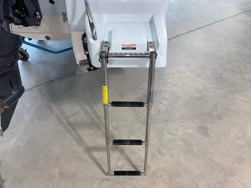 Slide: The Image of 2024 Robalo 226 Cayman boat with stainless steel swim ladder. - 21