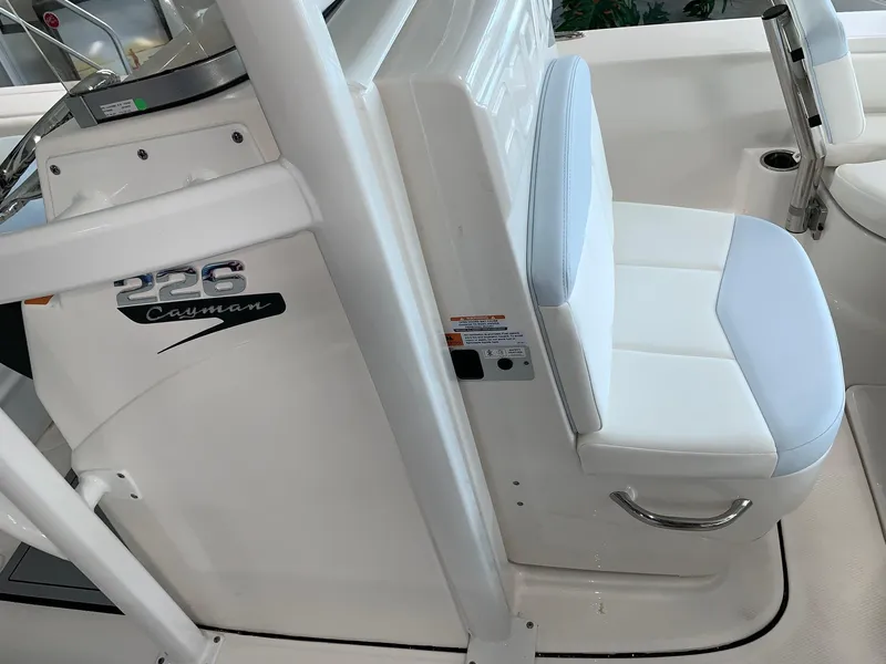 Slide: The Image of 2024 Robalo 226 Cayman boat interior with white seating. - 5