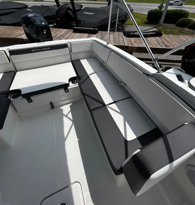 Slide: The Image of 2024 Bayliner VR4 boat interior with spacious seating and modern design. - 9